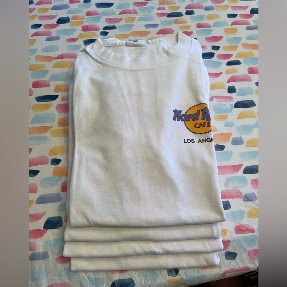 Like new, 4 vintage Hard Rock Cafe, XL men’s T-shirts purchased at locations.